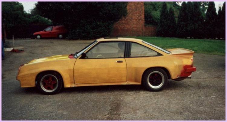 A silver car parked in front of a wood fence

AI-generated content may be incorrect.